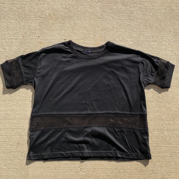 Black solid and mesh Brandy Melville top. - Picture 1 of 4